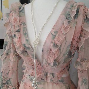 Deep V Ruffle Dress with Cut Out Details